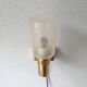 Brass applique with 1970 glass lampshade