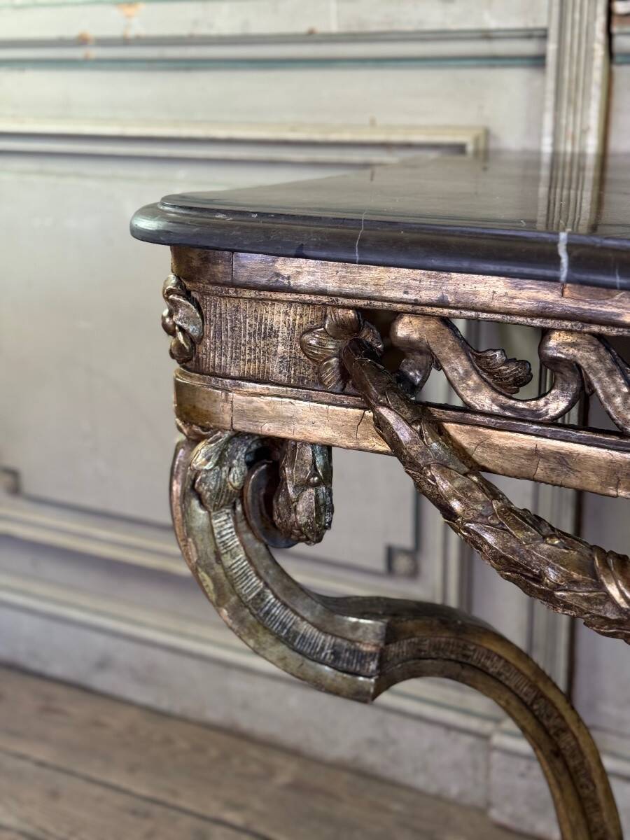 Transitional console in carved and gilded wood, France, 18th century