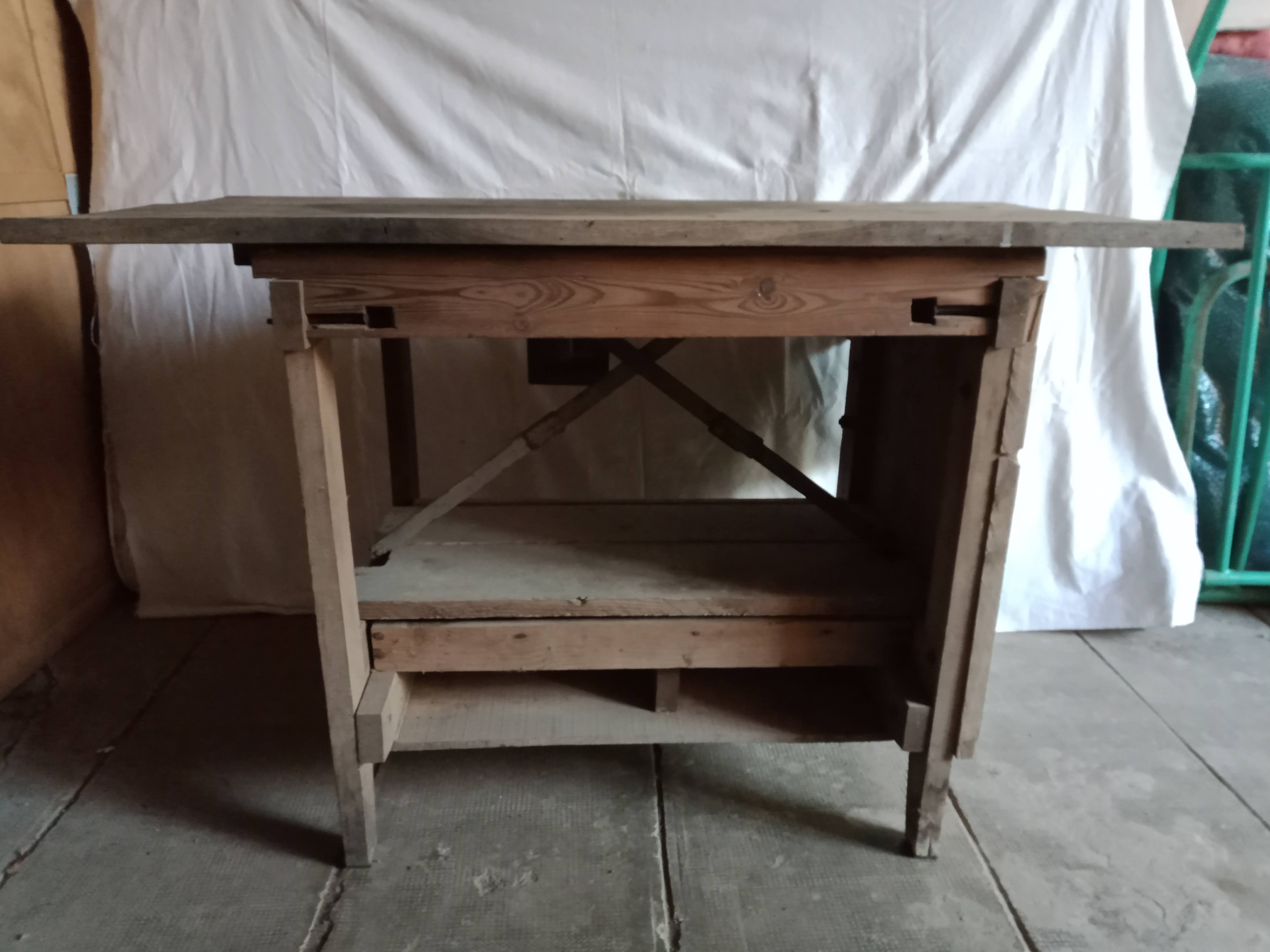 antique workbench with one drawer and two vices
