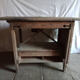 antique workbench with one drawer and two vices