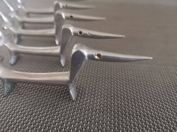 Suite de 5 porte-couteaux Teckel en bronze argenté Walter Bosse - Années 1950/1960