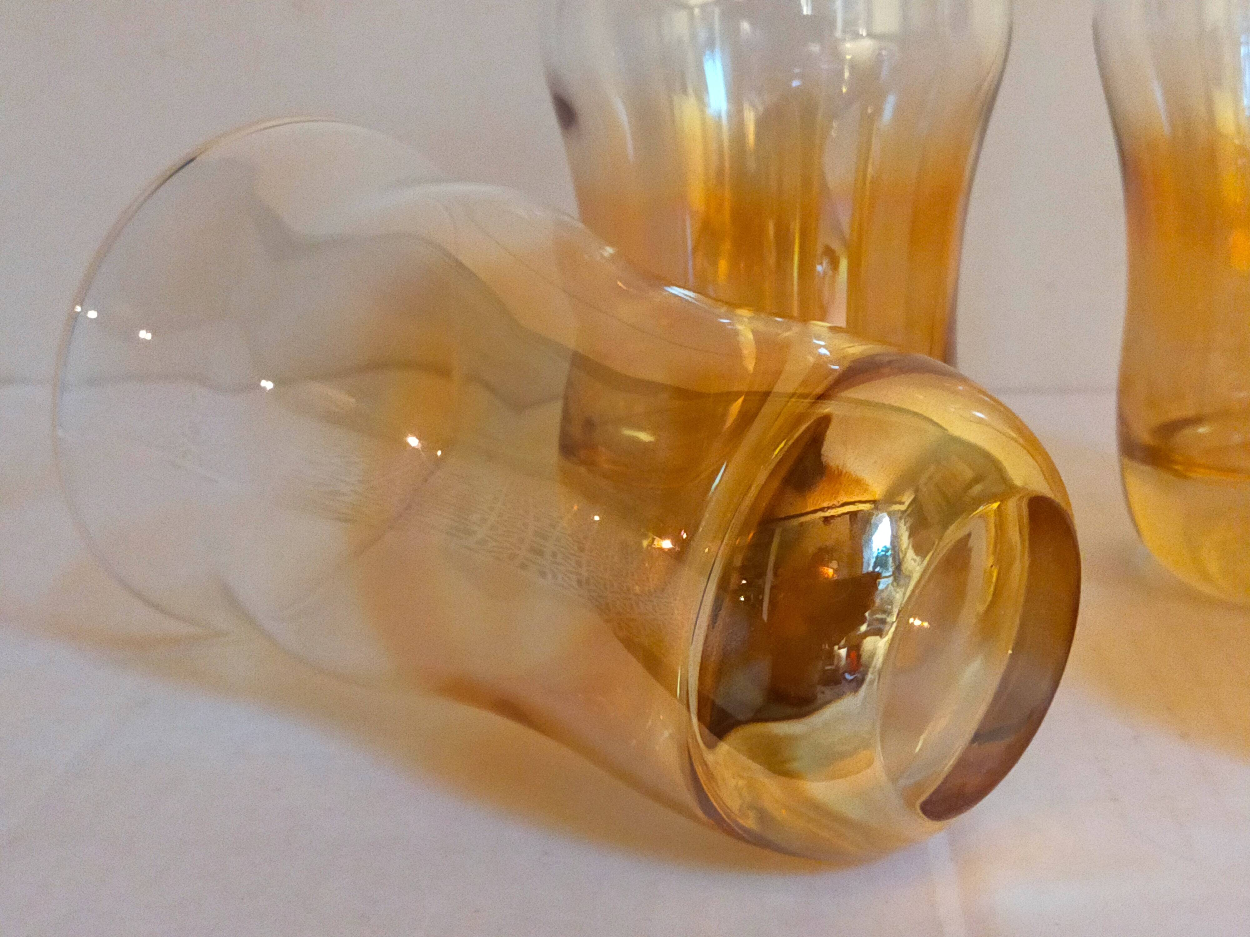 Four iridescent honey blown glass glasses