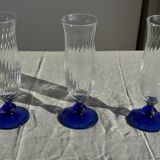 Set of 6 blue-footed champagne flutes; 3 pairs of designs.