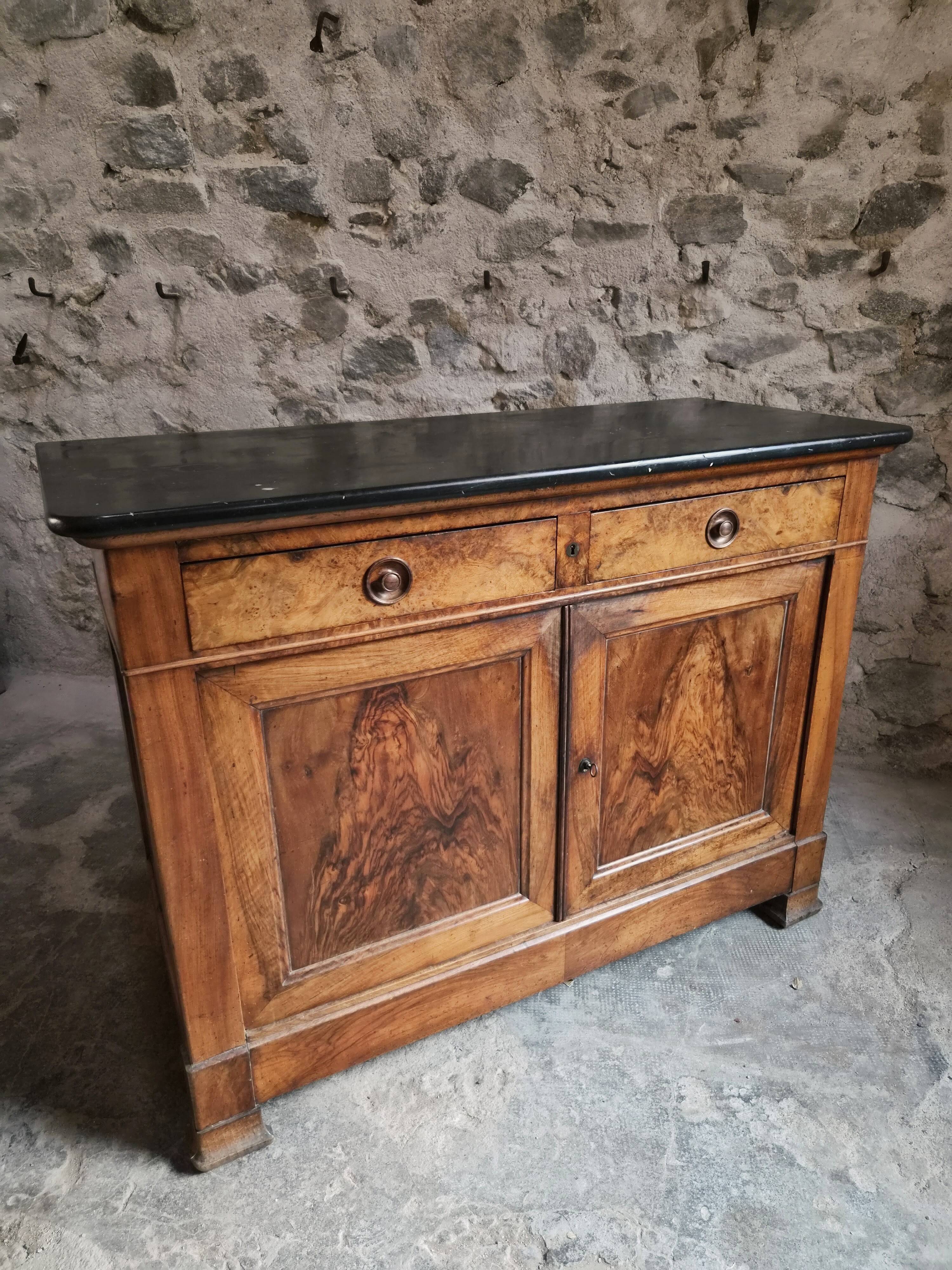 French Louis Philippe walnut buffet with black marble top, France, circa 1840–1860.