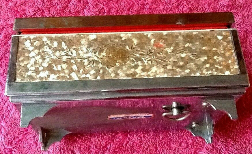 Vintage musical box with mirror psychedelic revolving wheel mechanism