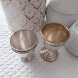 Antique egg cups on silver-plated metal stand