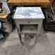 Vintage green patinated bedside table with marble and drawer