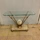 Travertine console from Fournier Paris over glass