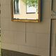 ART DECO BLACK AND GOLD MIRROR (1925-1945)