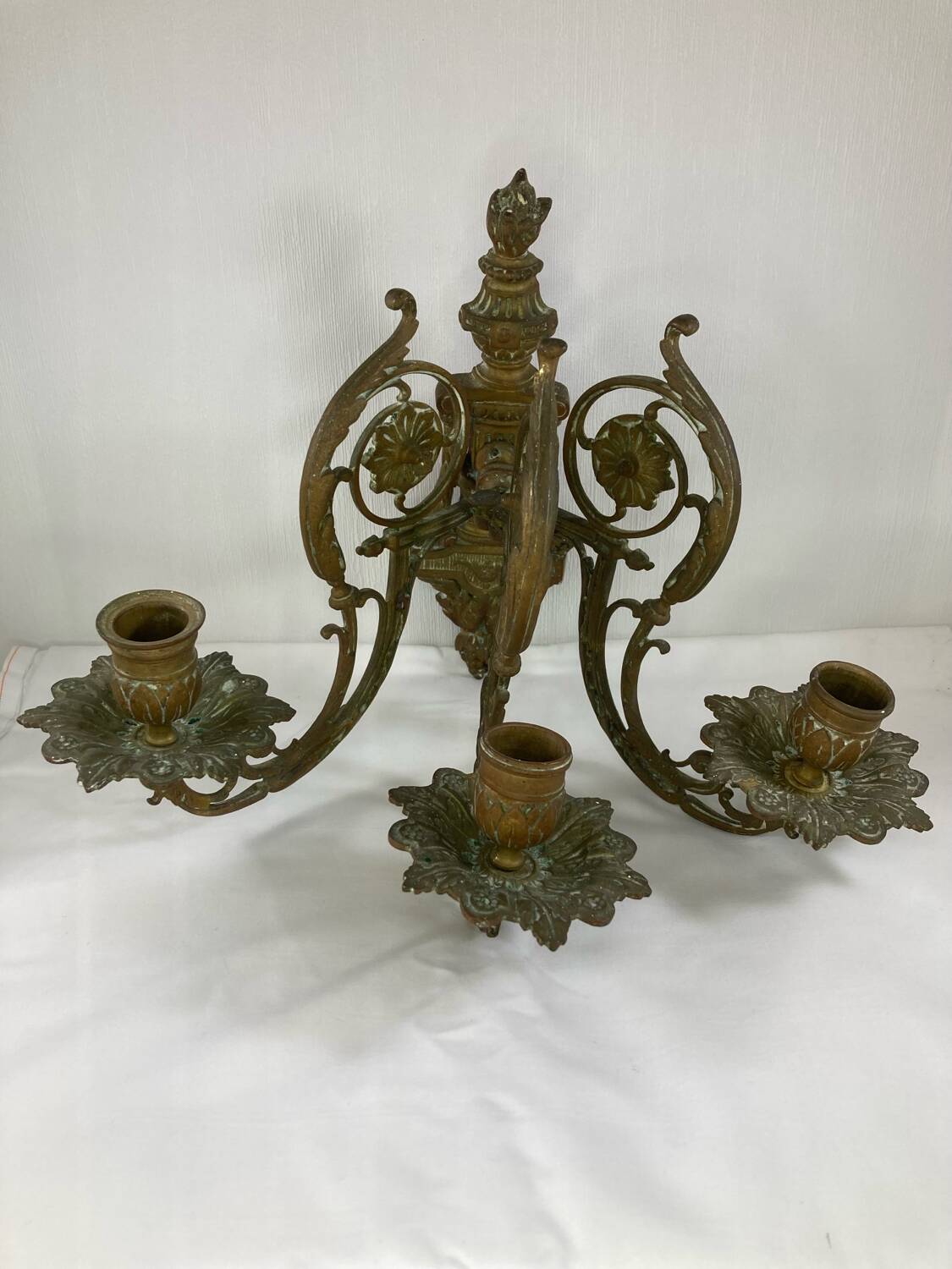 Pair of 3-light wall sconces in gilt bronze in the style