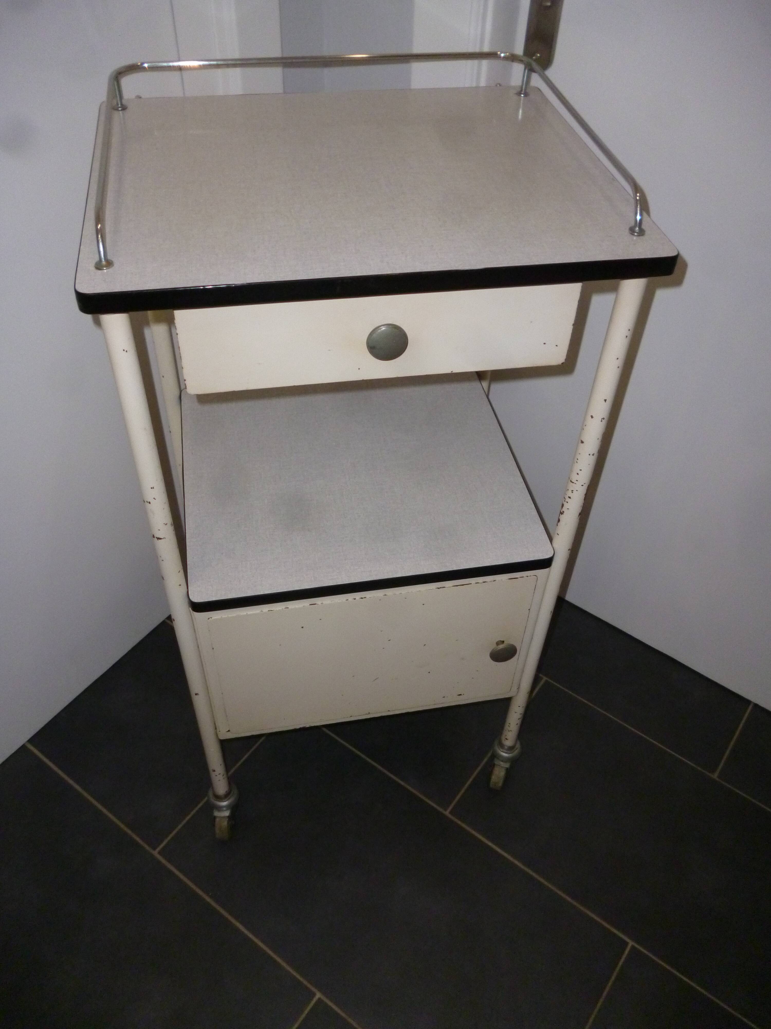 Old bedside on wheels