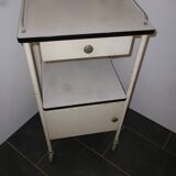 Old bedside on wheels