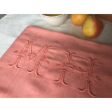 Ancient cloth in pure coral-tinted washed linen
