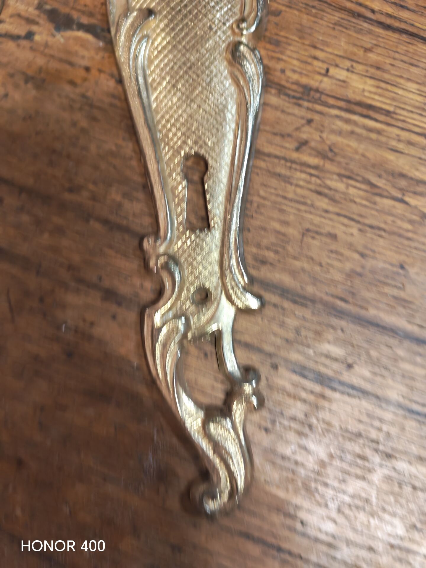 Pair of solid brass cleanliness plates in Louis XV rococo style.