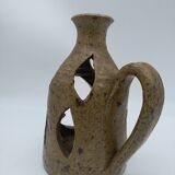 Stoneware candle holder.