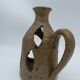 Stoneware candle holder.