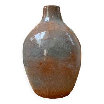 Glazed earth vase signed