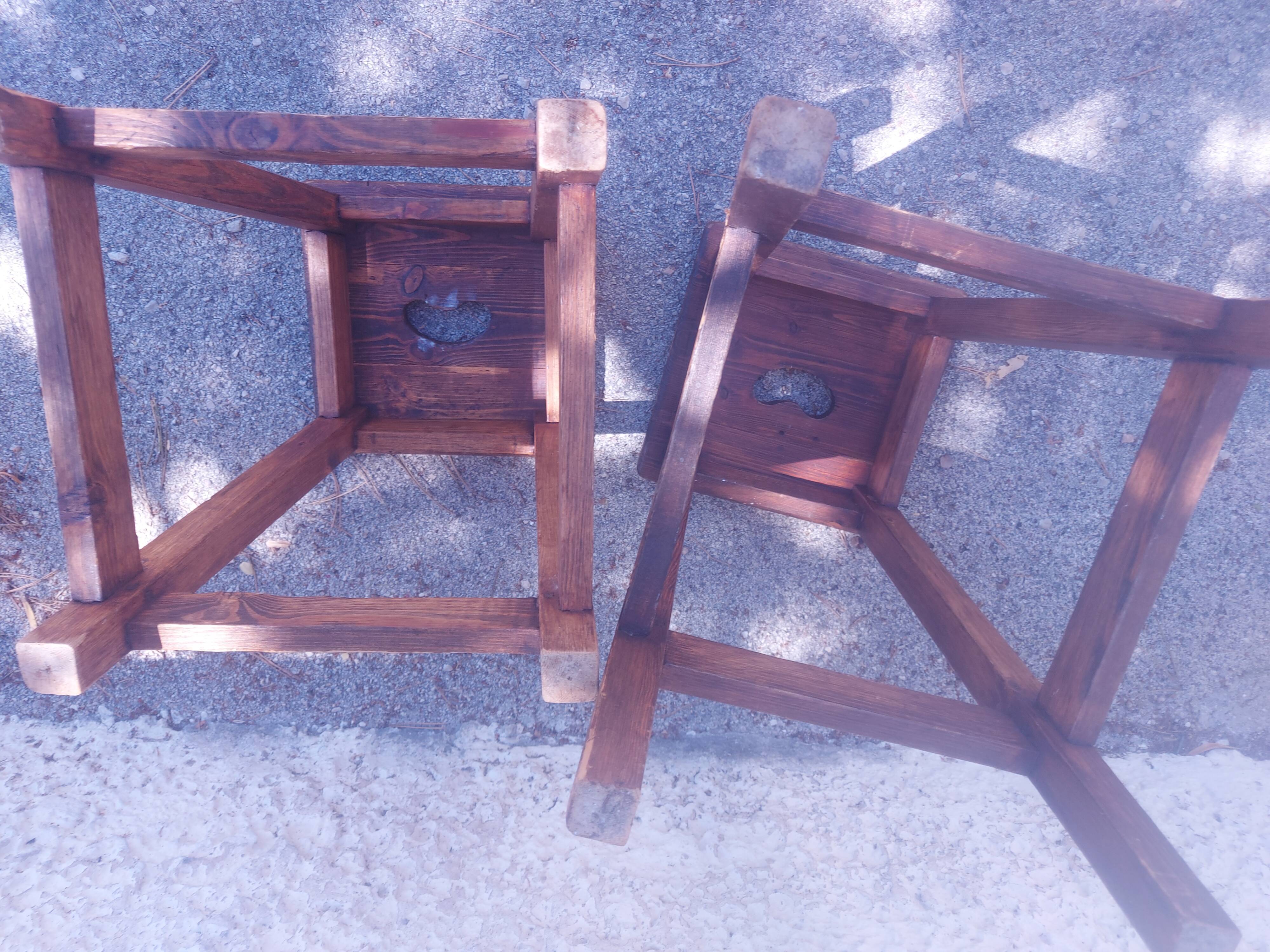Two vintage wooden stools