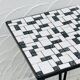Wrought iron stela and black and white tiled top from the 1960s.