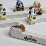 Six Le Merzer porcelain knife holders, 6 cm
