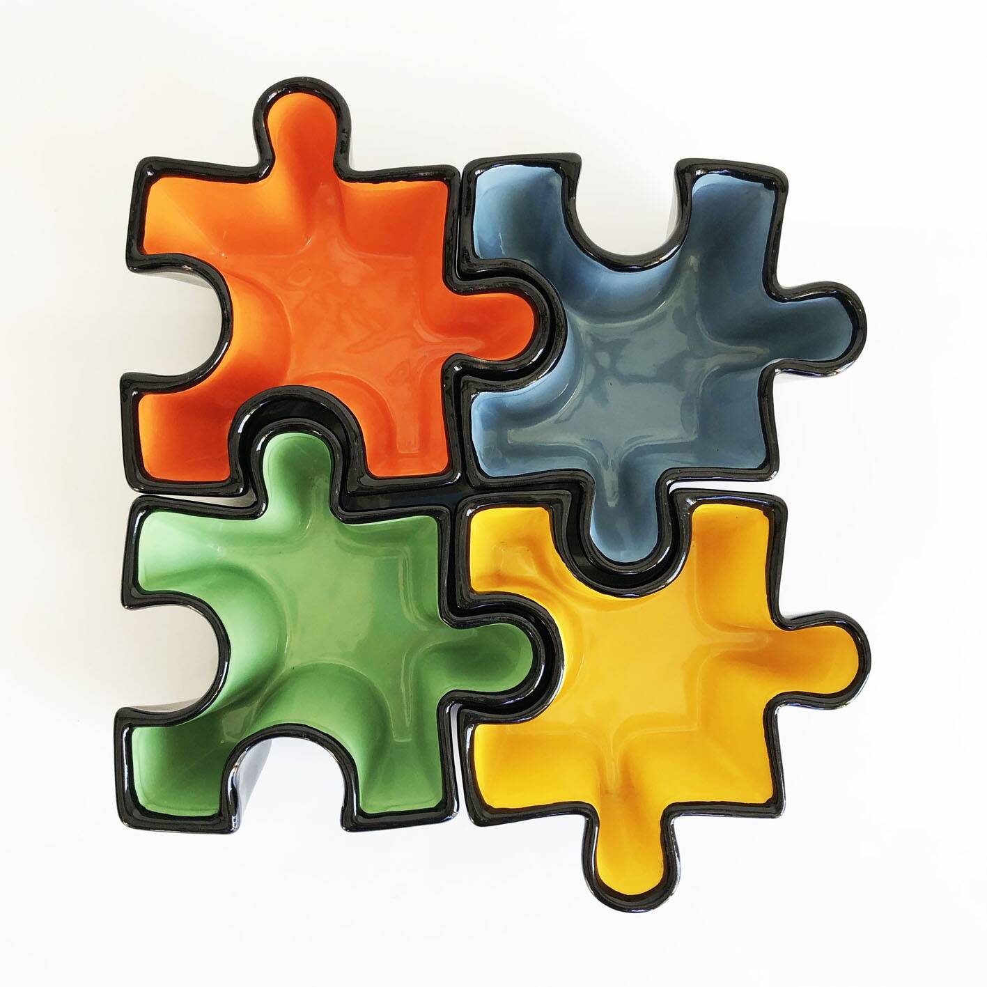 Ensemble de vide poches puzzle en céramique. Italie, années 80