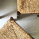 Lot of 4 modernist chairs in solid wood, leather and straw, Italy 1970.