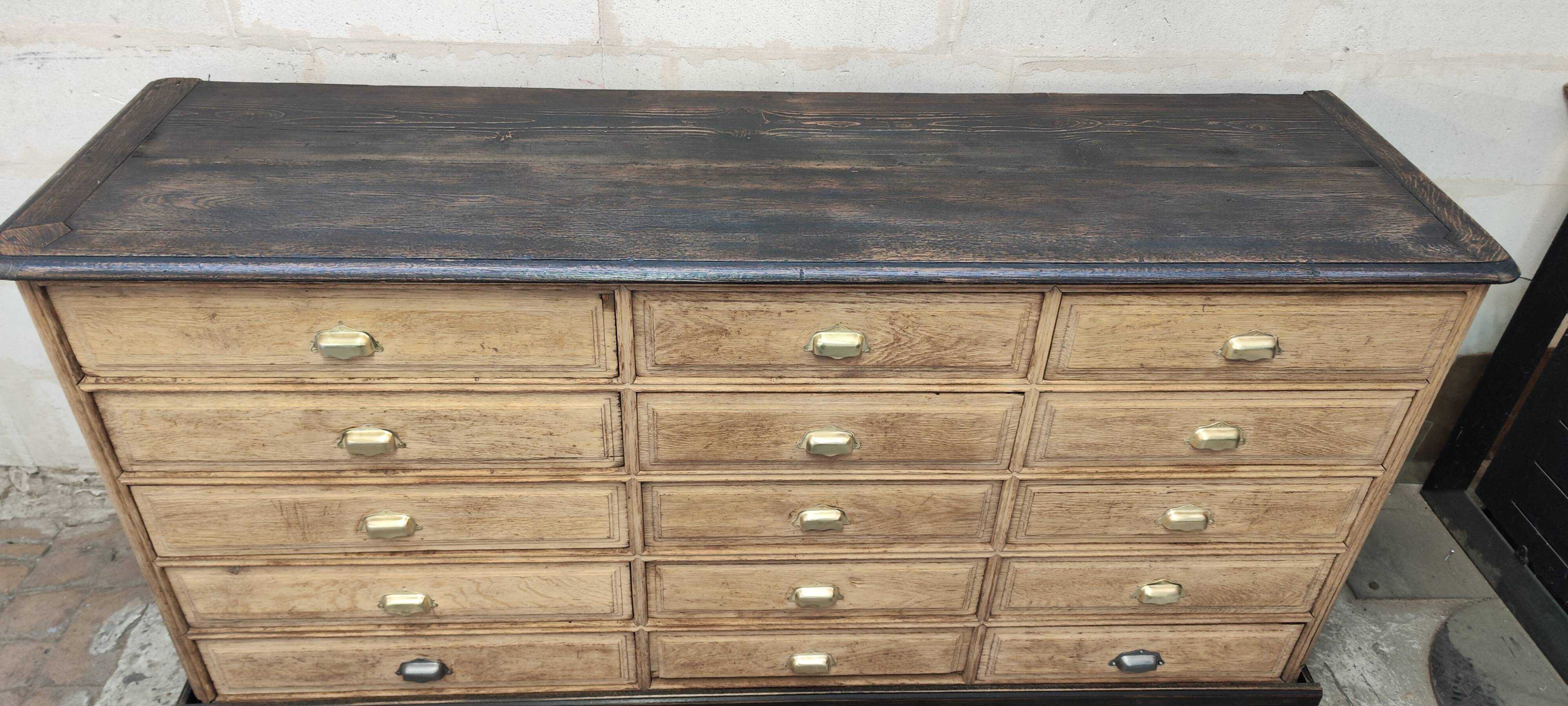 Old oak cabinet with fifteen drawers