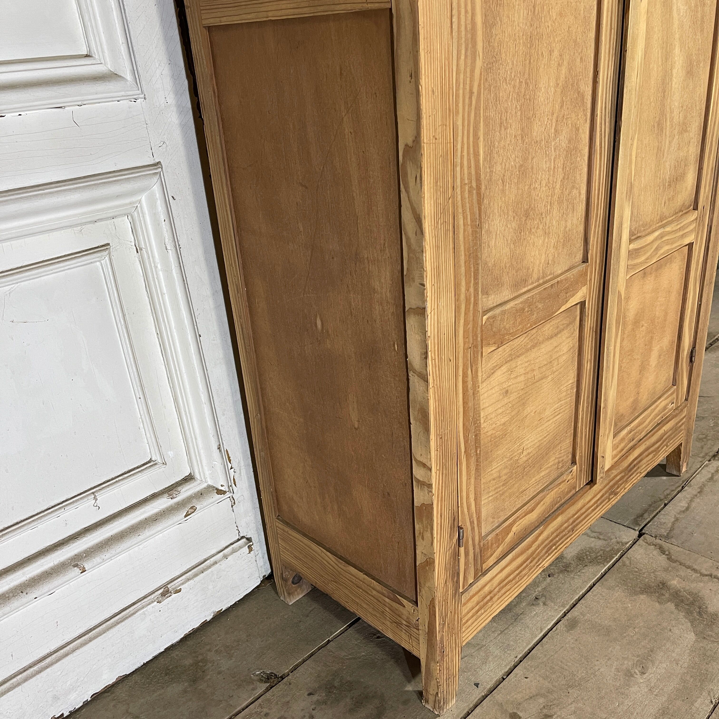 Parisian wardrobe in raw wood