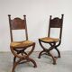 Pair of Neo-Renaissance oak chairs with straw seats, 1910