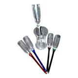 Set of 5 vintage colored glass champagne flutes gathered in a bouquet in a vase