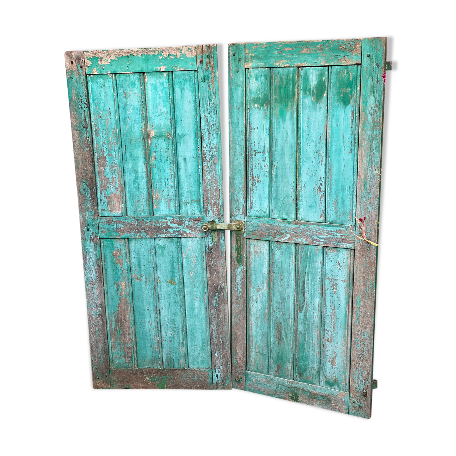 Pair of old wooden shutters green mint color