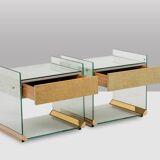 Pair of bedside tables or sofa ends in brass, glass and mirror. 1970s.
