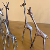 Series of 5 golden brass giraffes