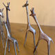 Série de 5 girafes en laiton doré