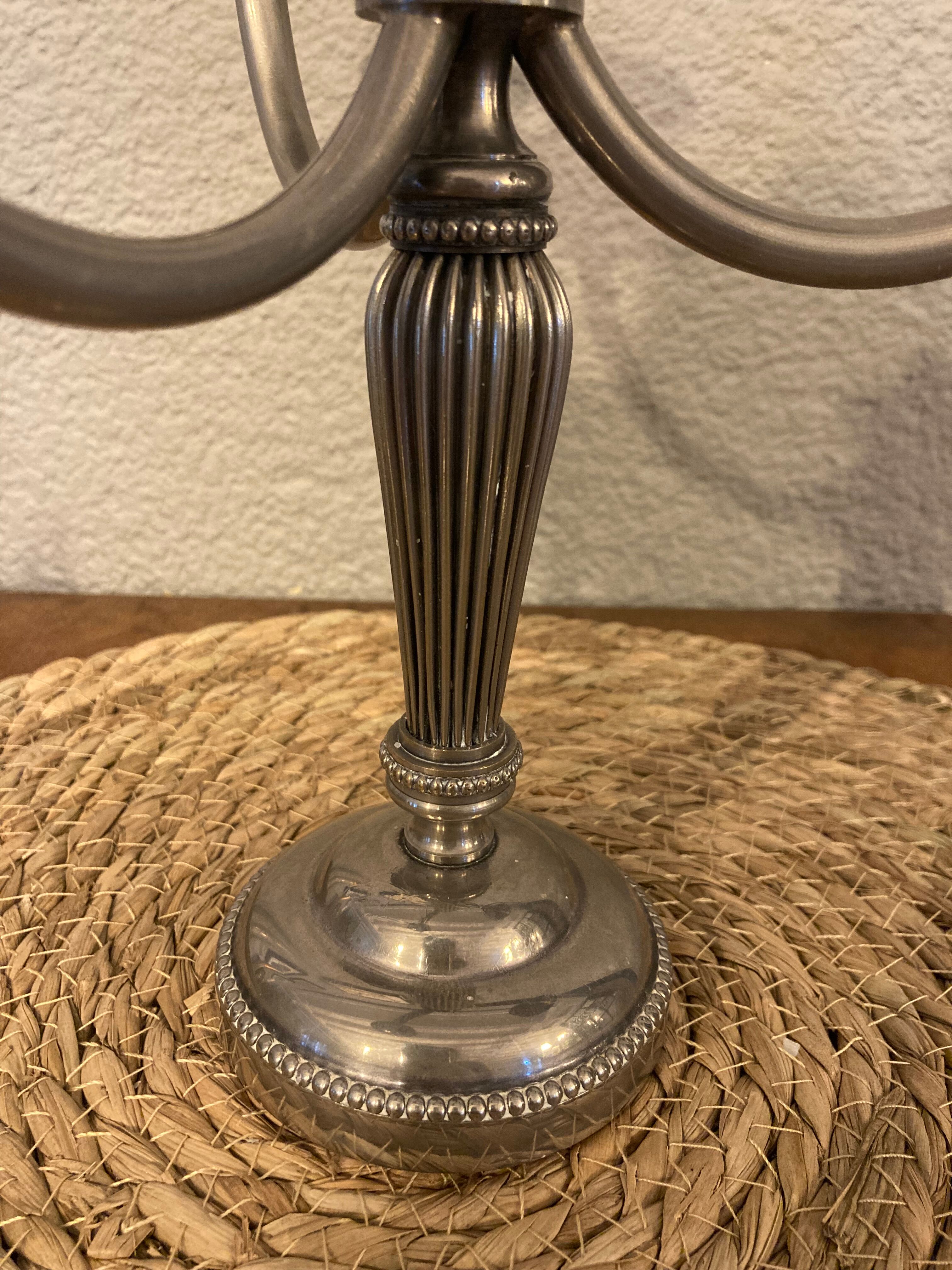 Three-spoke candle holder