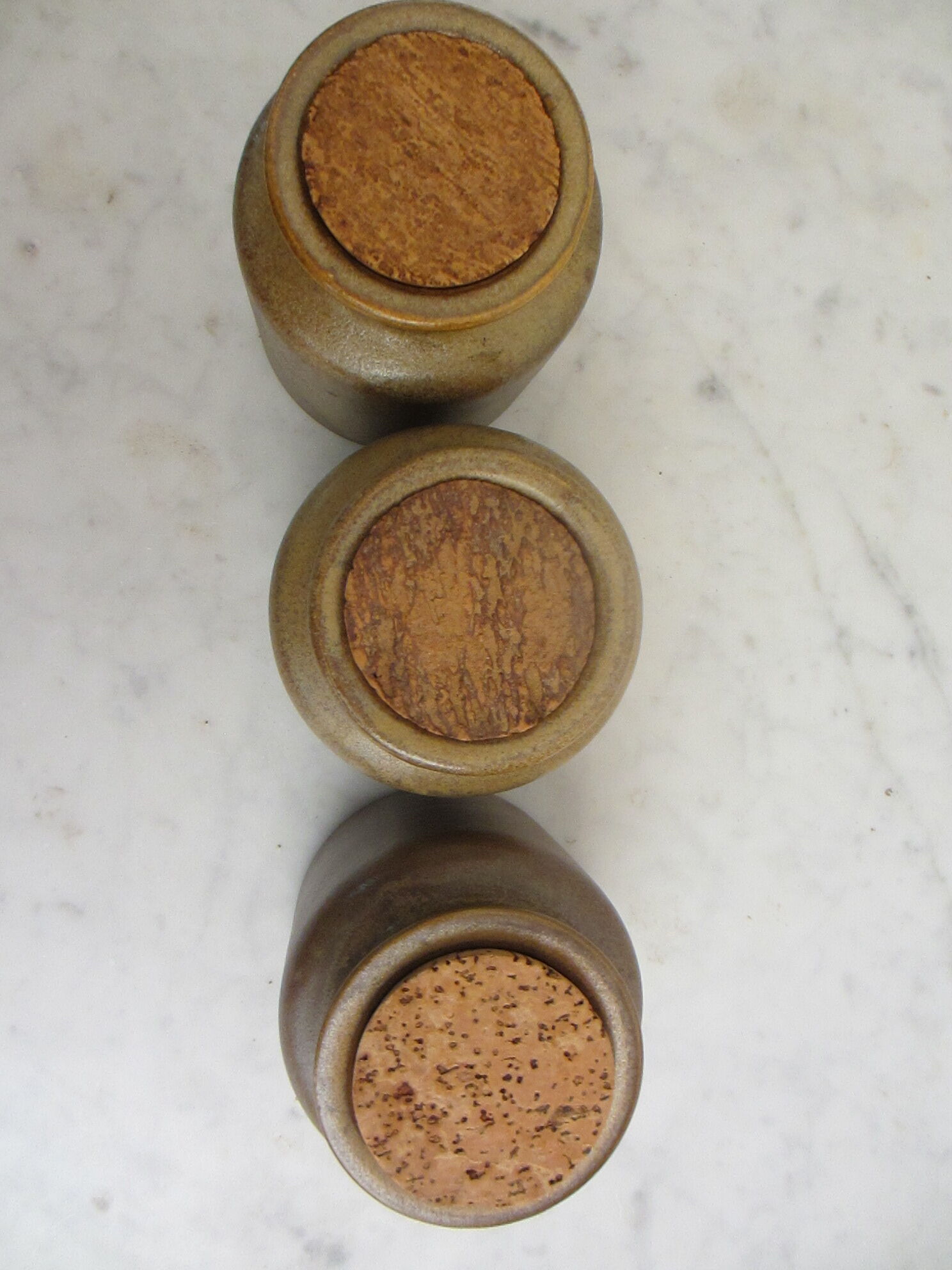 Series of 3 sandstone pots