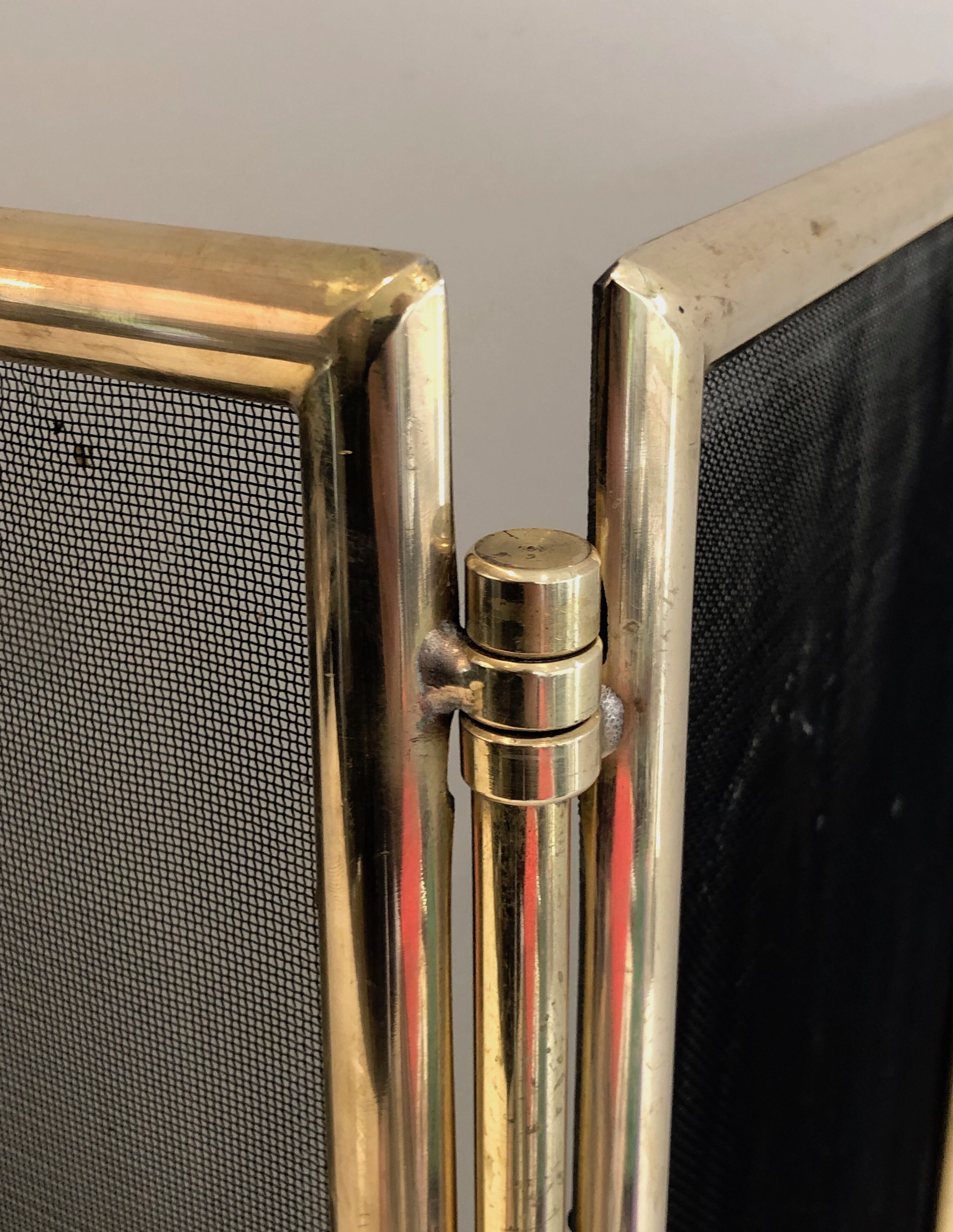 Brass and wire mesh firewall. french work. around 1970