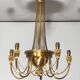Neoclassical style brass chandelier decorated with pearl garlands