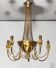 Neoclassical style brass chandelier decorated with pearl garlands