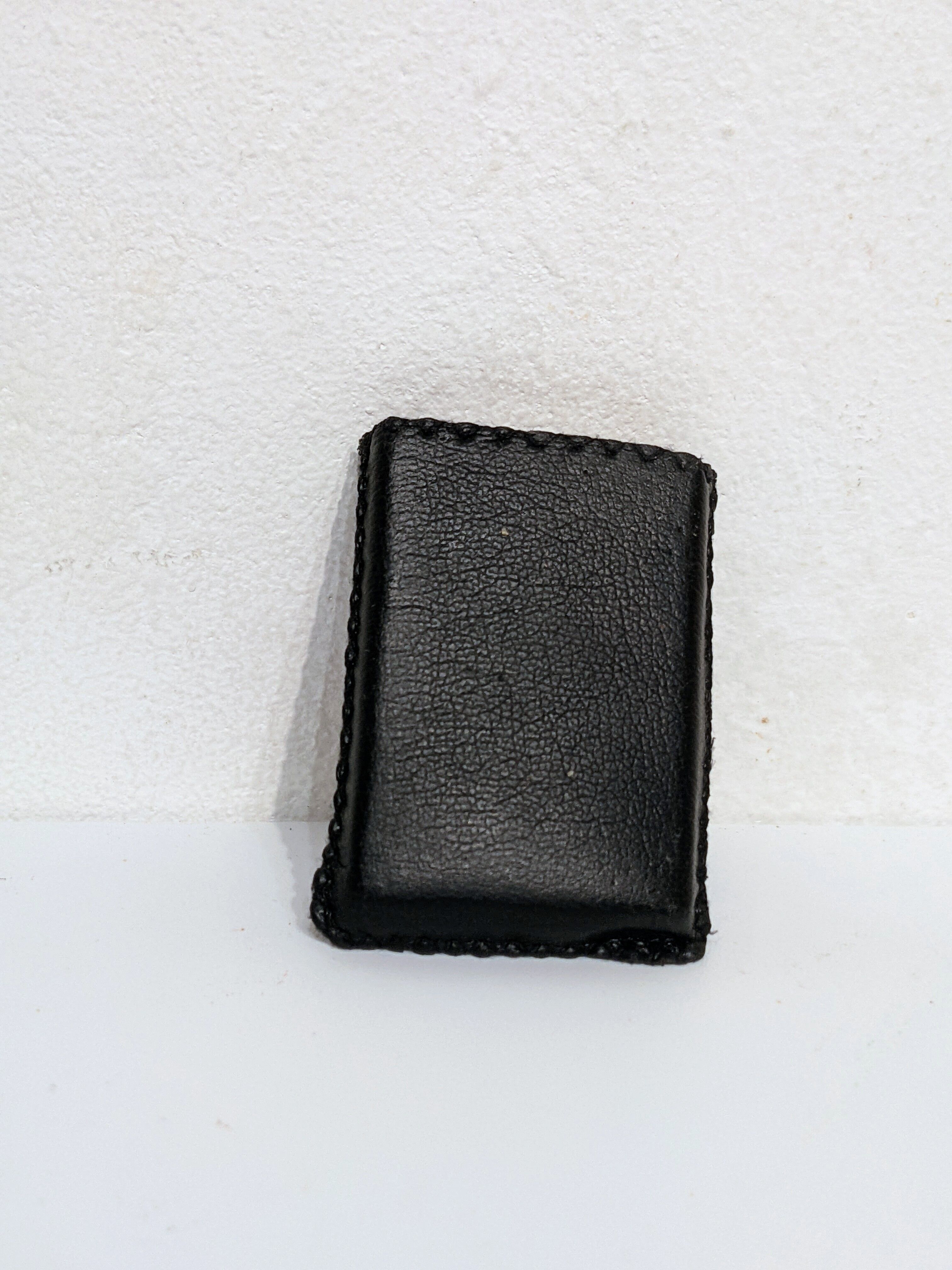 Old lighter new picoflam new condition in its small pocket leather case some stains on the et