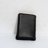 Old lighter new picoflam new condition in its small pocket leather case some stains on the et
