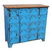 Old blue metal locker with wooden top