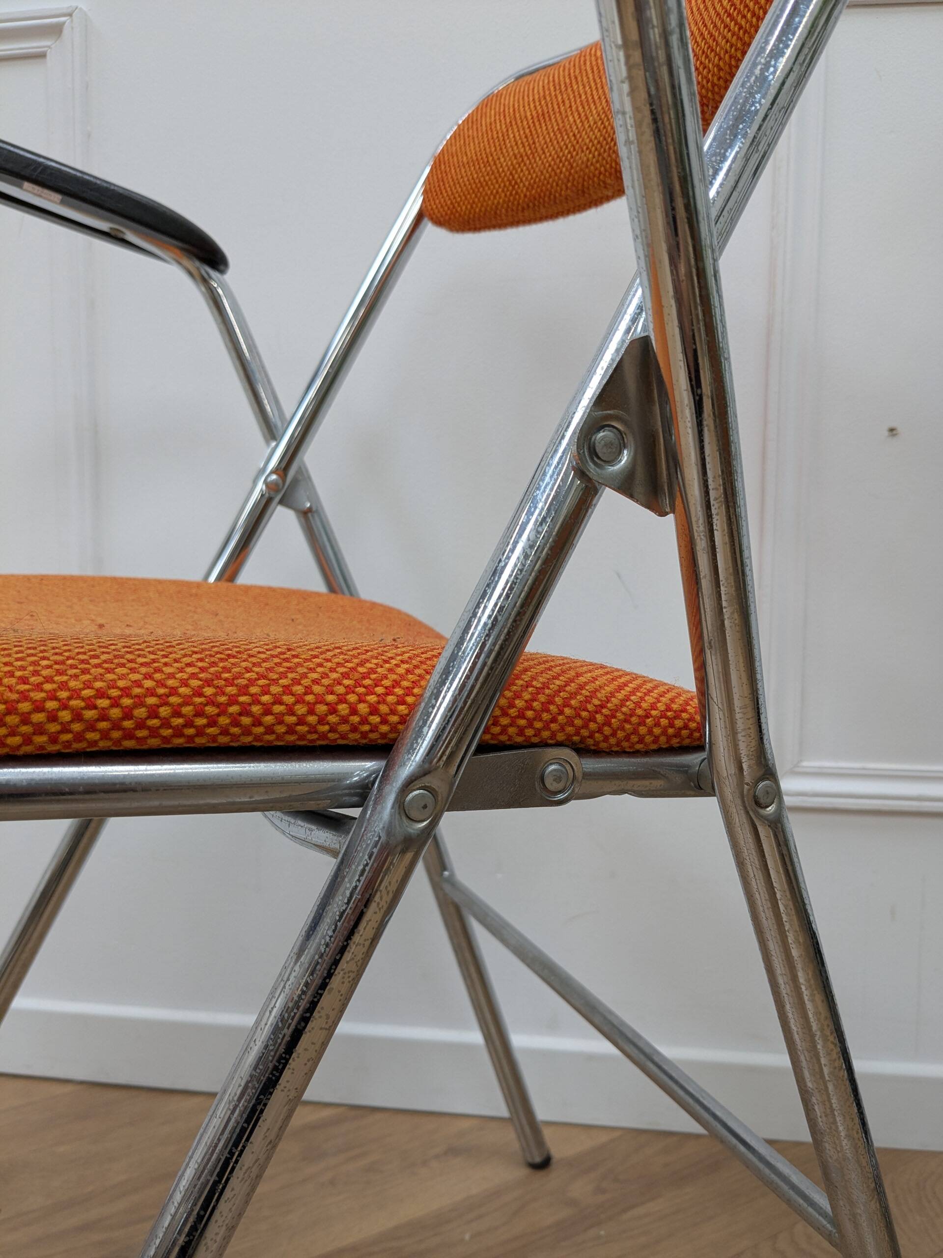 Orange folding chair