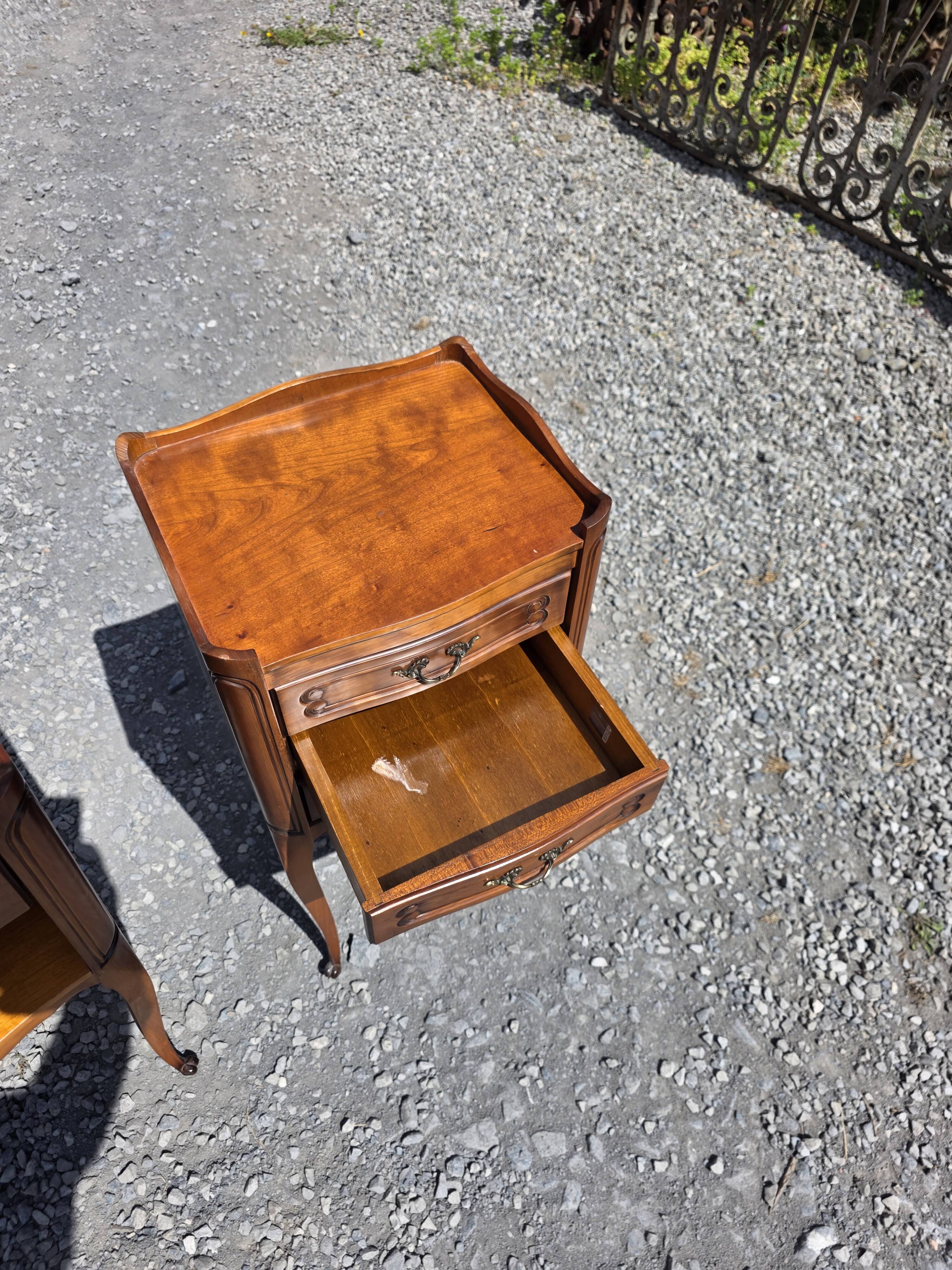 Pair of Louis XV style bedside tables in cherry wood.