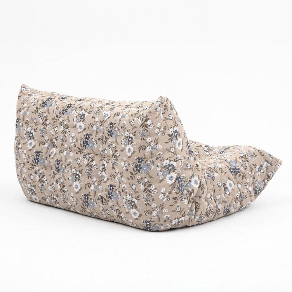 Pouf Togo et canapé 2 places tissu imprimé par Michel Ducaroy pour Ligne Roset