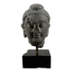 Sculpture of a Buddha head in grey schist from Gandhara, ancient Greece.