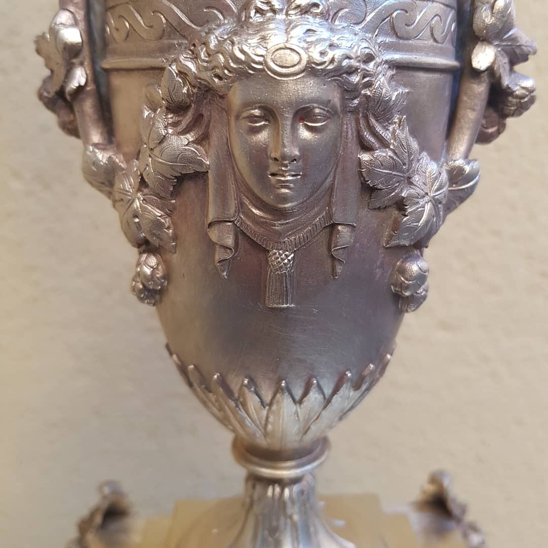 A pair of candle holders