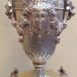 A pair of candle holders