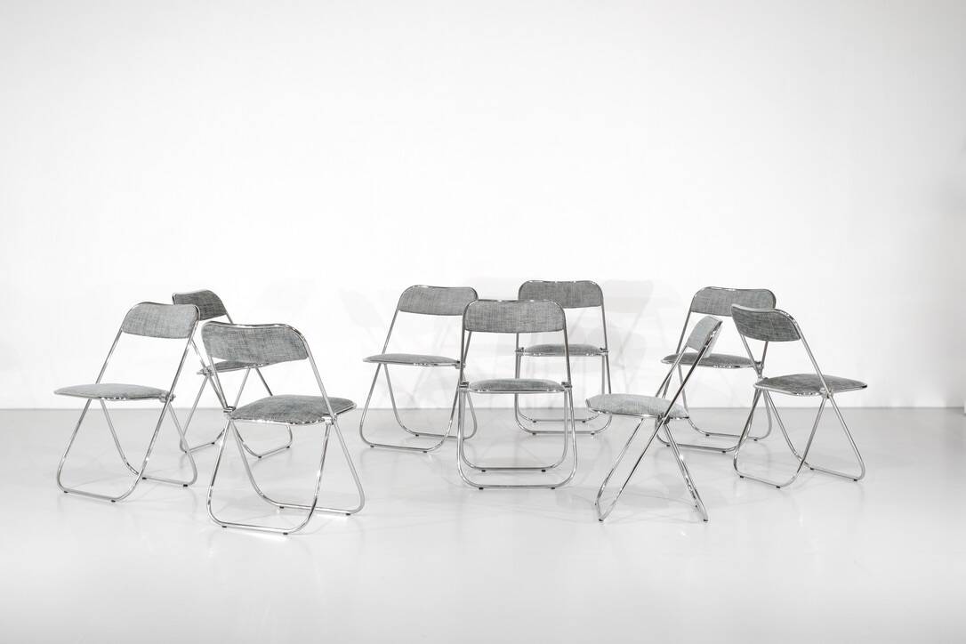 Set of 9 chrome folding chairs with fabric from the 1970s.