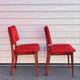 Pair of vintage wooden chairs with red fabric – 1960s/70s